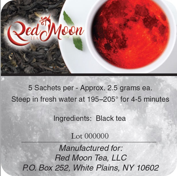 A picture of the description on the back of a Silver To Go Tin of Darjeeling Tea from Red Moon Tea.