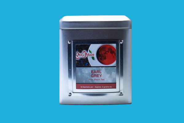 A picture of a Silver Tin Canister of Earl Grey Fine Black Tea from Red Moon Tea.