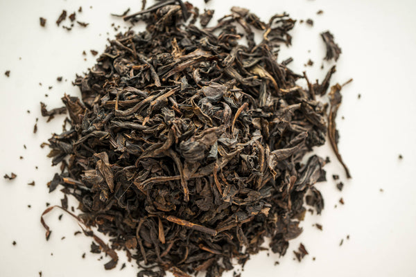 A close up picture of Oolong Tea Leaves by Red Moon Tea.